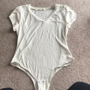 white shortsleeved bodysuit